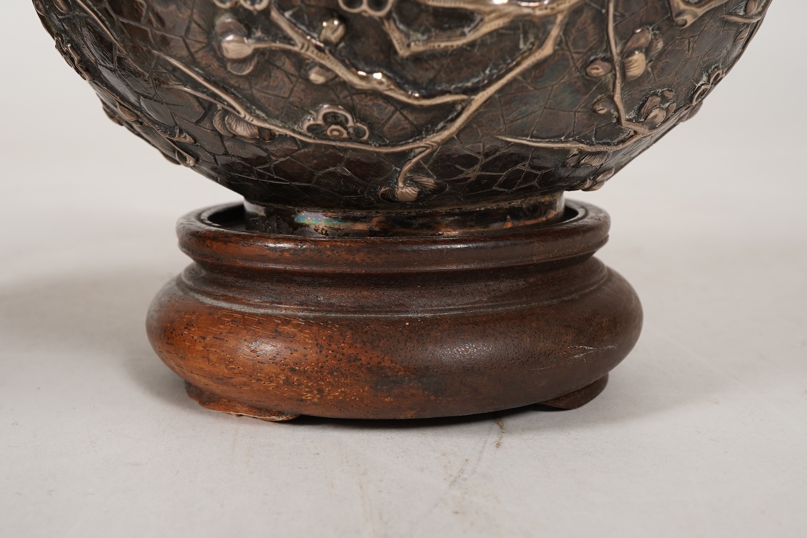 A pair of late 19th/early 20th century Chinese Export white metal two handled globular vases, by Wang Hing, Hong Kong